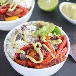 Fiesta Chicken + Cilantro Lime Rice Fajita Bowl with Avocado Chipotle Crema.