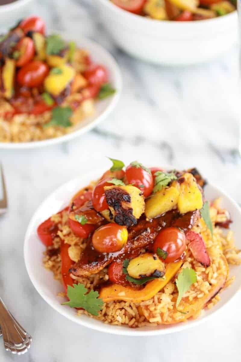 Jerk Chicken with Fired Rice and Grilled Pineapple Salsa https://www.halfbakedharvest.com/