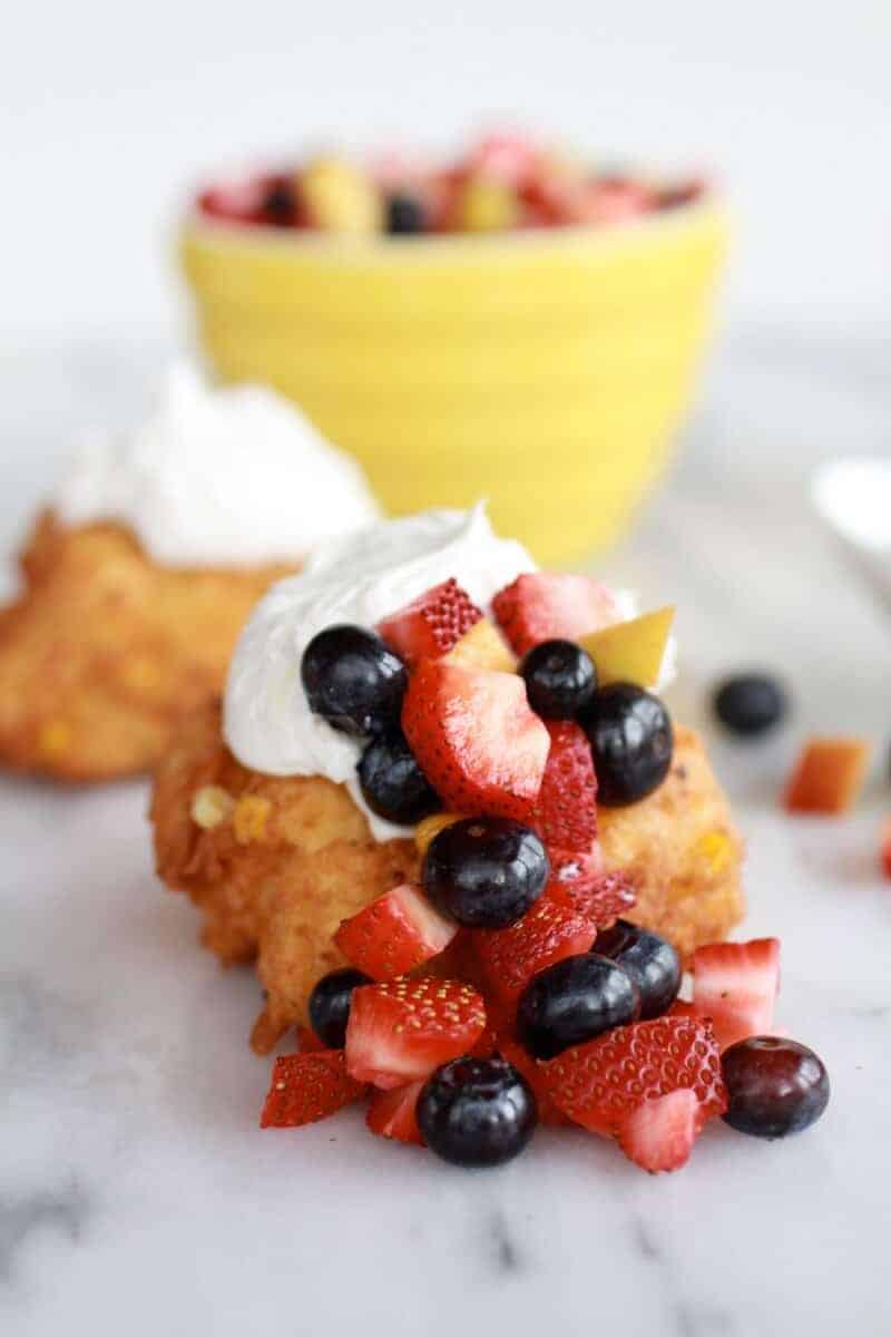 Corn Fritters with Coconut Whipped Cream and Sweet Honey Bourbon Syrup | https://www.halfbakedharvest.com/