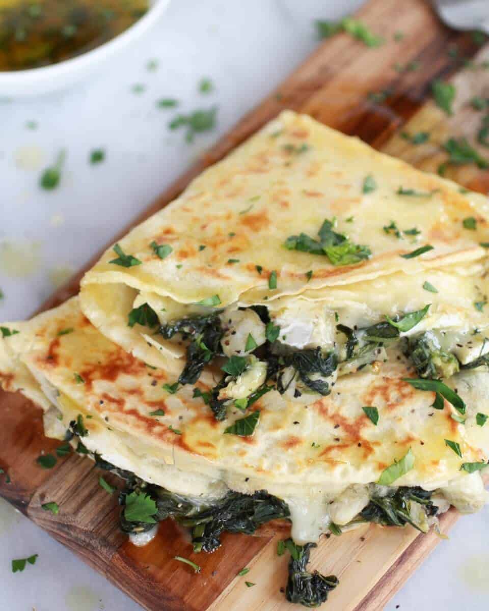 Spinach Artichoke and Brie Crepes with Sweet Honey Sauce | https://www.halfbakedharvest.com/