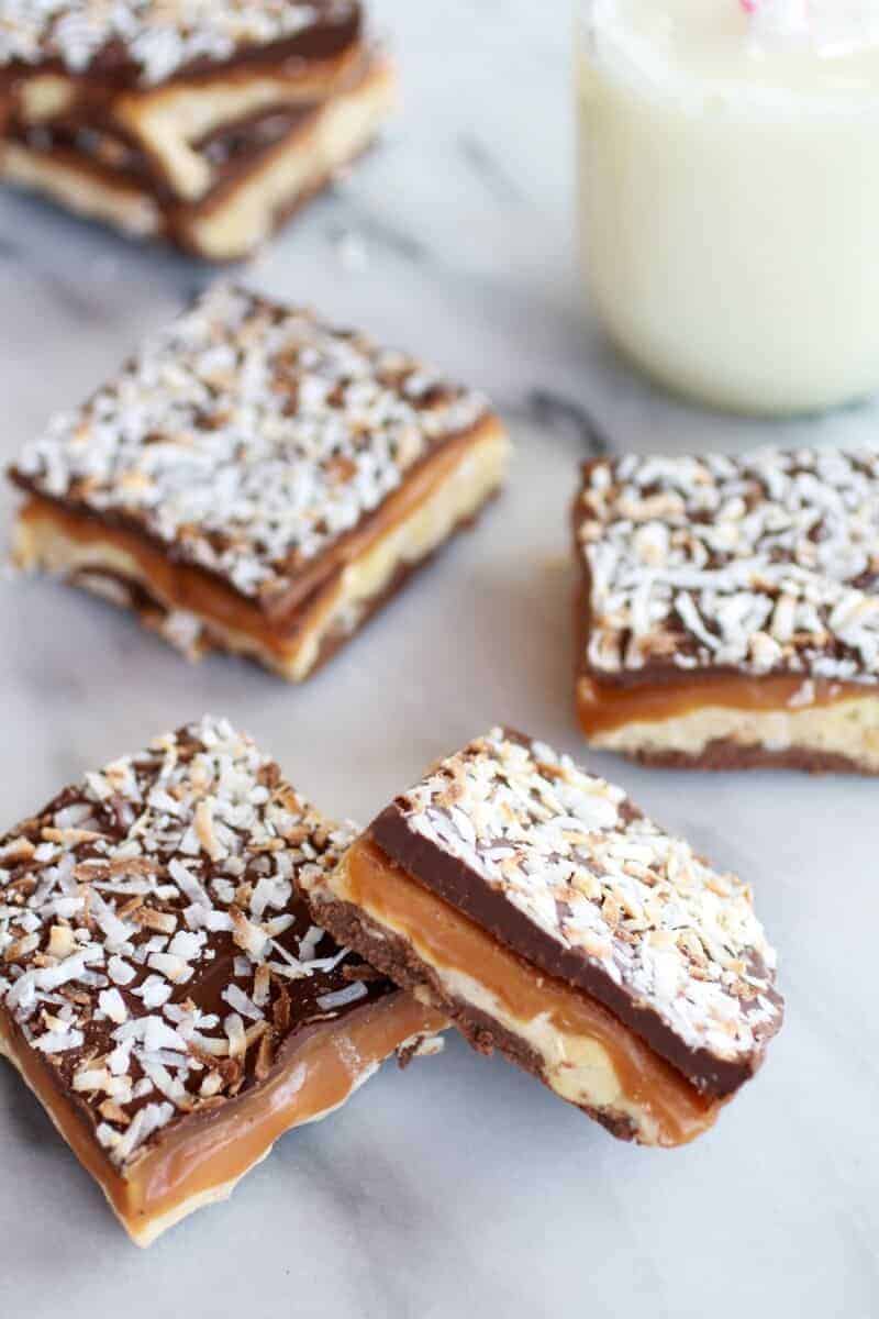 Toasted Coconut Caramel Peanut Butter Snickers Bars | halfbakedharvest.com