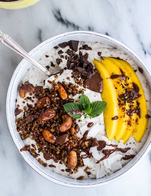 Coconut Banana Oats Smoothie Bowl with Crunchy Black Sesame Quinoa Cereal + Mango | halfbakedharvest.com