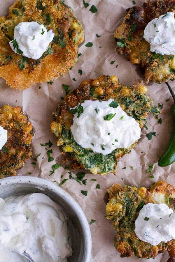 Spinach and Artichoke Corn Fritters with Brie and Sweet Honey Jalapeño Cream.-1