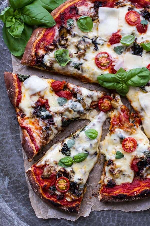 Fontina Caramelized Onion, Chorizo, Spinach, And Artichoke Pizza | Flavorful Homemade Pizza Recipes