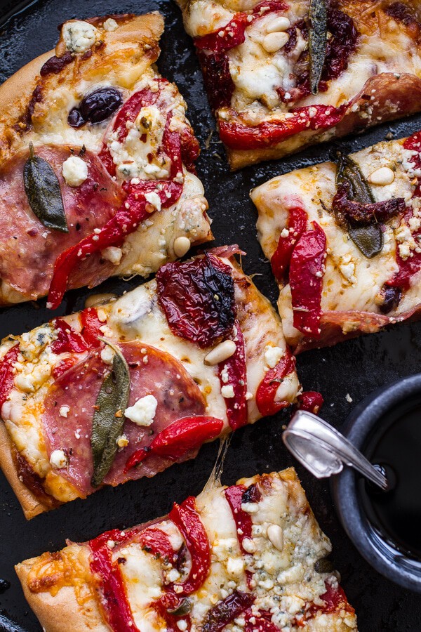 Sun-Dried Tomato and Olive Pesto Pizza with Salami + Roasted Red Peppers | halfbakedharvest.com @hbharvest
