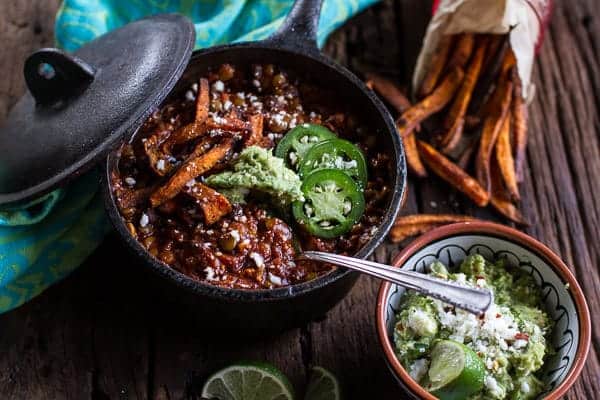 Spicy Black Bean and Lentil Chili with Cotija Guacamole + Chipotle Sweet Potato Fries | halfbakedharvest.com @hbharvest