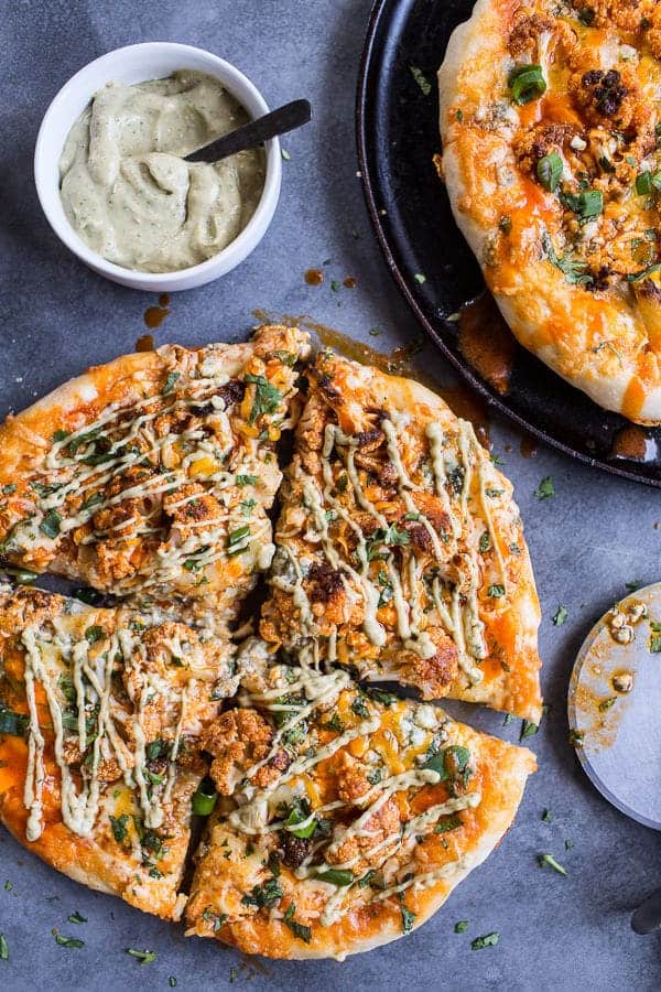 Buffalo Roasted Cauliflower Pizza with Chipotle Blue Cheese Avocado Drizzle | halfbakedharvest.com @hbharvest