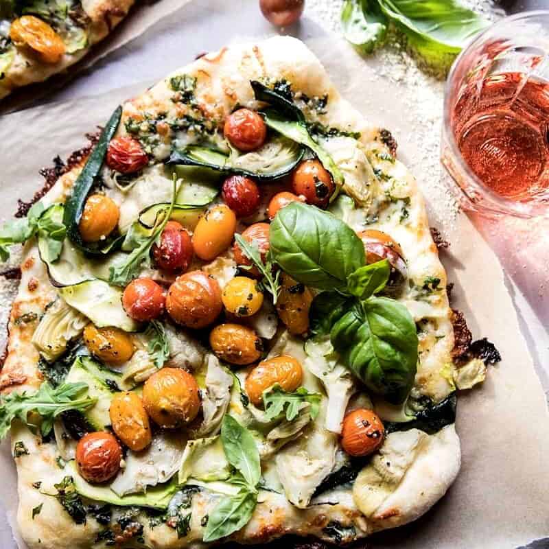 Burst Cherry Tomato, Artichoke, and Zucchini Pesto Pizza. - Half