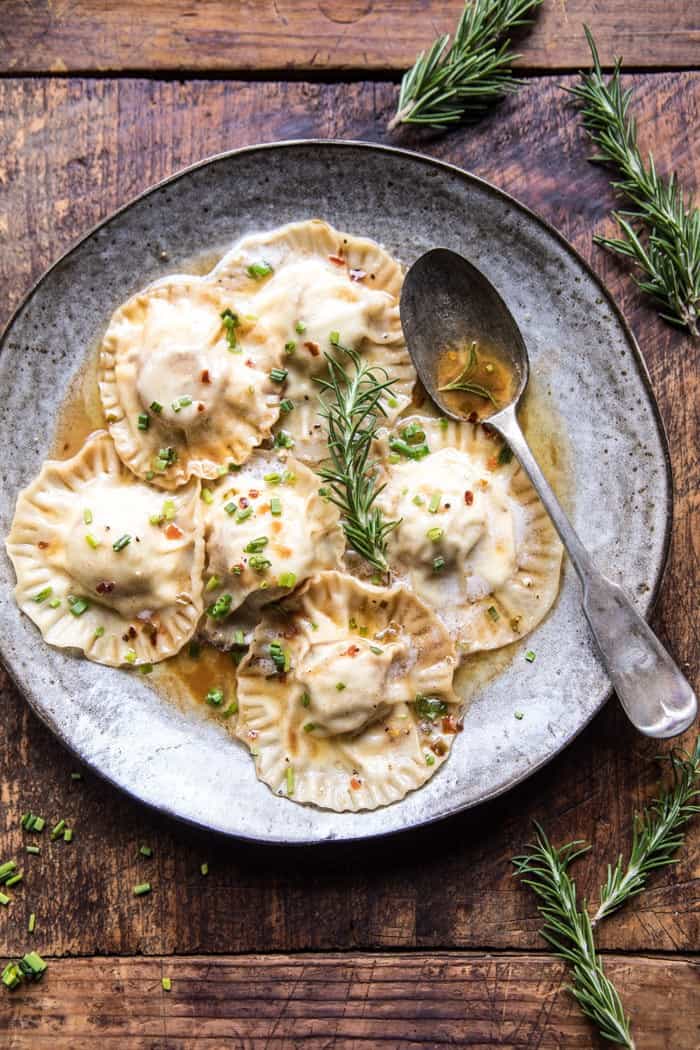 Seared Scallop Ravioli with Lemon Rosemary Butter Sauce.