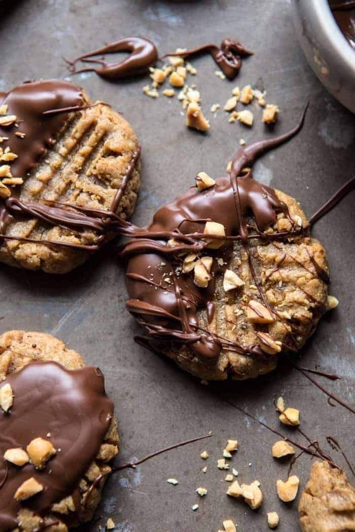 5 Ingredient Chocolate Dipped Peanut Butter Cookies | halfbakedharvest.com #healthy #cookies #dates #glutenfree