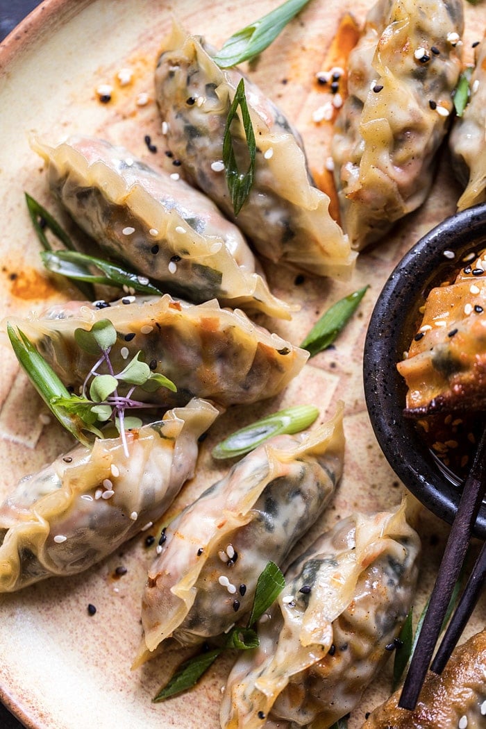 Homemade Vegetable Potstickers with Toasted Sesame Honey Soy Sauce | halfbakedharvest.com #vegan #recipes #healthy #homemade