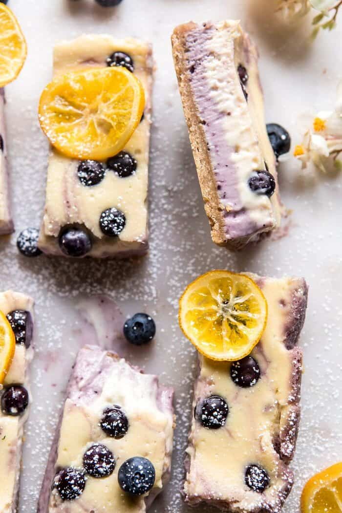 Blueberry Lemon Cheesecake Bars with Candied Lemon | halfbakedharvest.com #spring #easter #cheesecake #dessert
