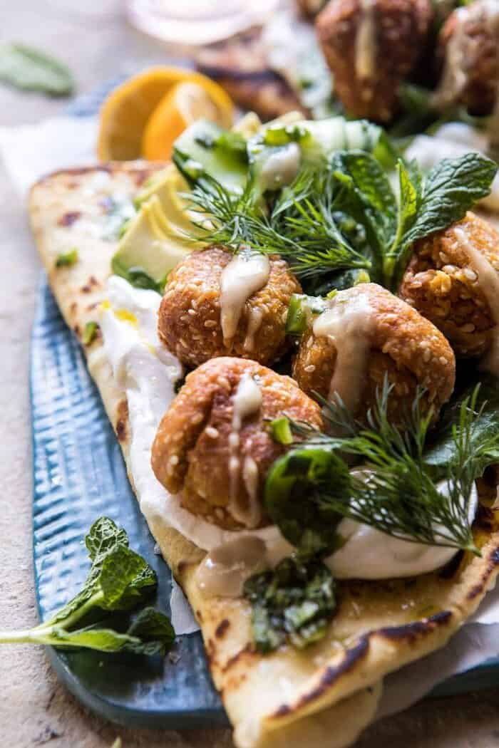 Sesame Falafel with Ginger Tahini and Jalapeño Sauce | halfbakedharvest.com #greek #healthy #recipes