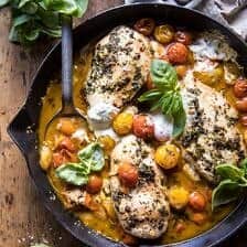Cheesy Tomato Basil Stuffed Chicken | halfbakedharvest.com #chicken #easy #recipes
