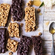 Chocolate Dipped Peanut Butter and Honey Cheerio Bars | halfbakedharvest.com #chocolate #dessert #easyrecipe