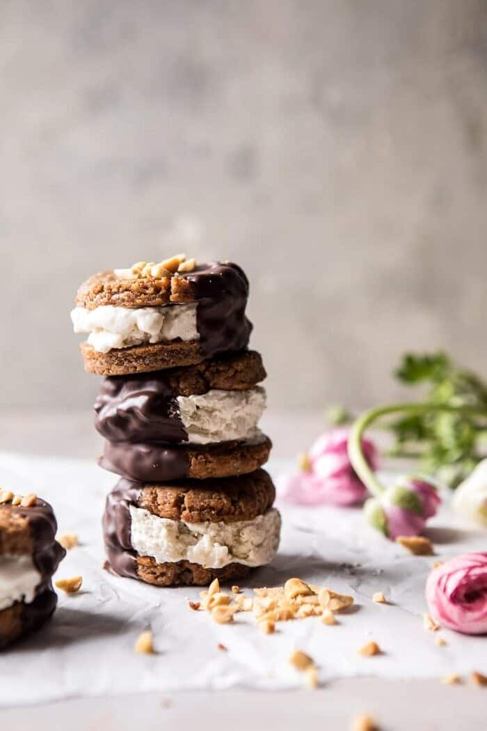 far away, front on photo of Chocolate Dipped Peanut Cookie Ice Cream Sandwiches