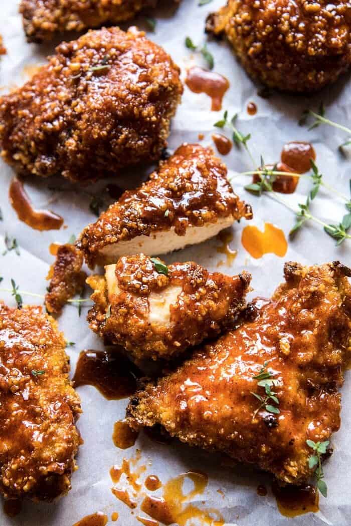 angled photo of Oven Fried Southern Hot Honey Chicken that has been cut into