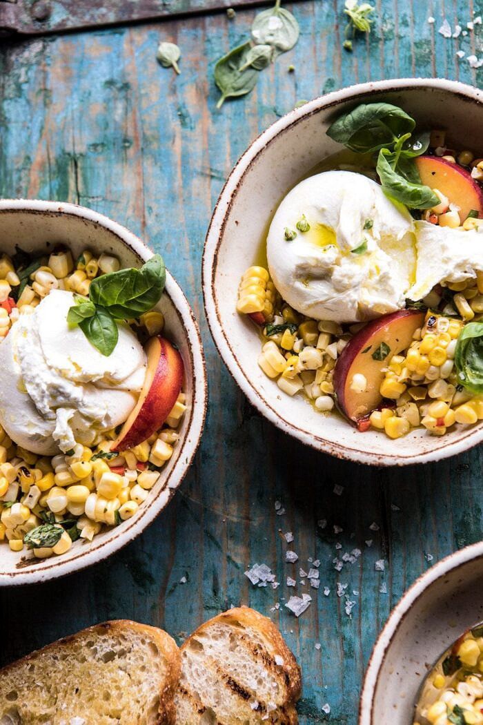 angled photo of Spicy Corn and Peaches with Burrata
