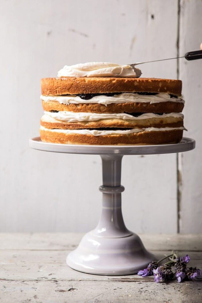 photo of unfrosted Blackberry Lavender Naked Cake with White Chocolate Buttercream 