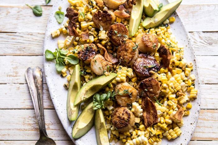 horizontal overhead photo of Brown Butter Scallops with Corn, Bacon, and Avocado Salad 