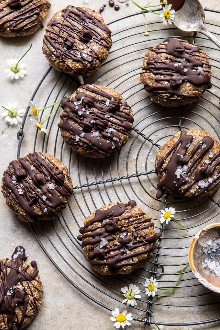overhead photo of 6 Ingredient No Bake Chocolate Chip Cookies with flowers and salt in photo 