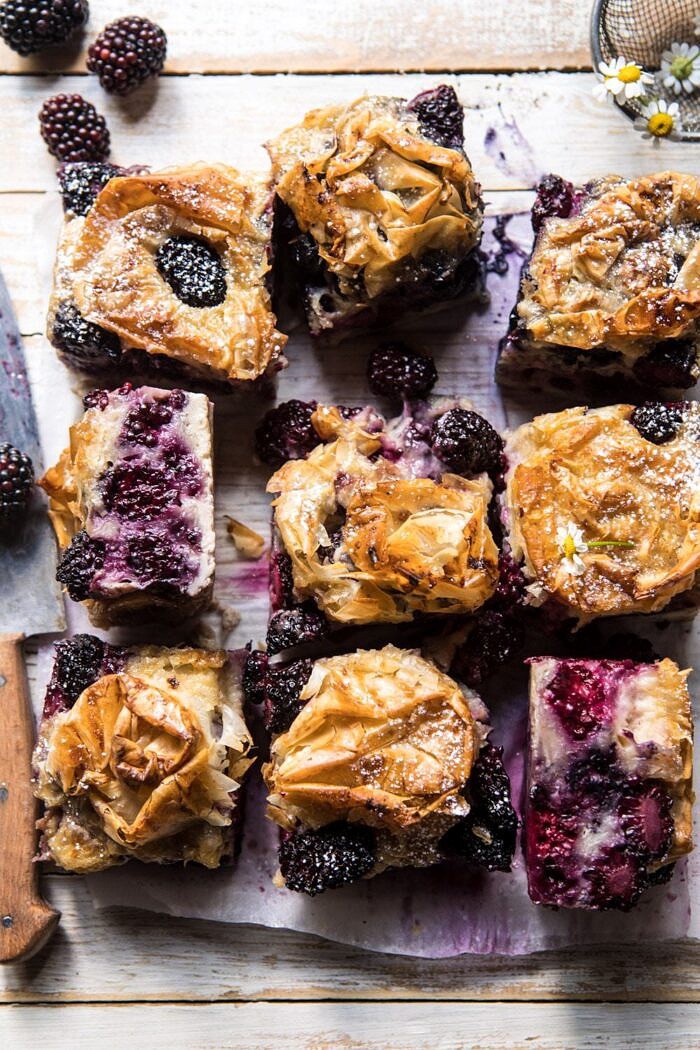 overhead photo of Blackberry Ruffled Milk Pie with bars turned outward to expose the filling 