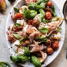 Fresh Fig, Prosciutto, and Arugula Salad with Cherry Tomato Vinaigrette | halfbakedharvest.com #summer #salad #tomatoes #burrata
