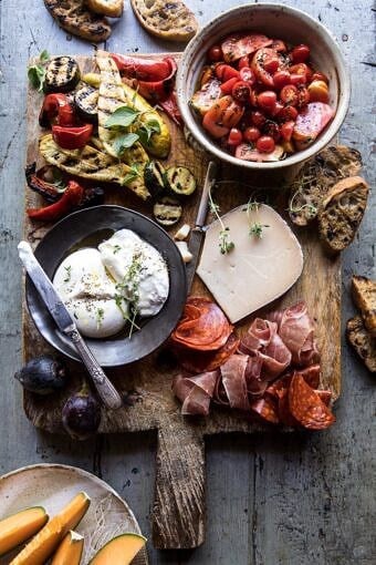 Marinated Tomato and Grilled Veggie Cheese Board | halfbakedharvest.com #cheeseboard #summerrecipes #easy #4thofjulyrecipe