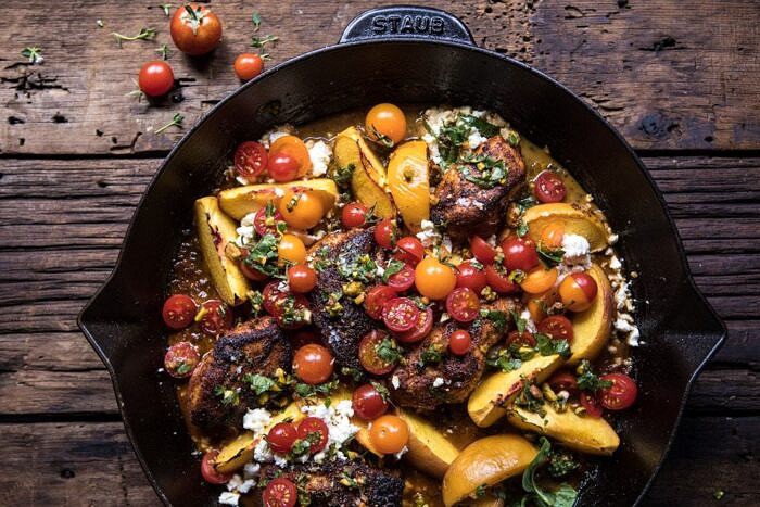 horizontal photo of Skillet Moroccan Chicken with Tomatoes, Peaches, and Feta 