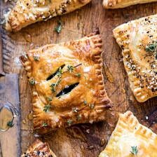 Caramelized Onion, Spinach, and Cheddar Flaky Pastries | halfbakedharvest.com #onions #tarts #fall #autumnrecipes #easy #holiday #appetizer