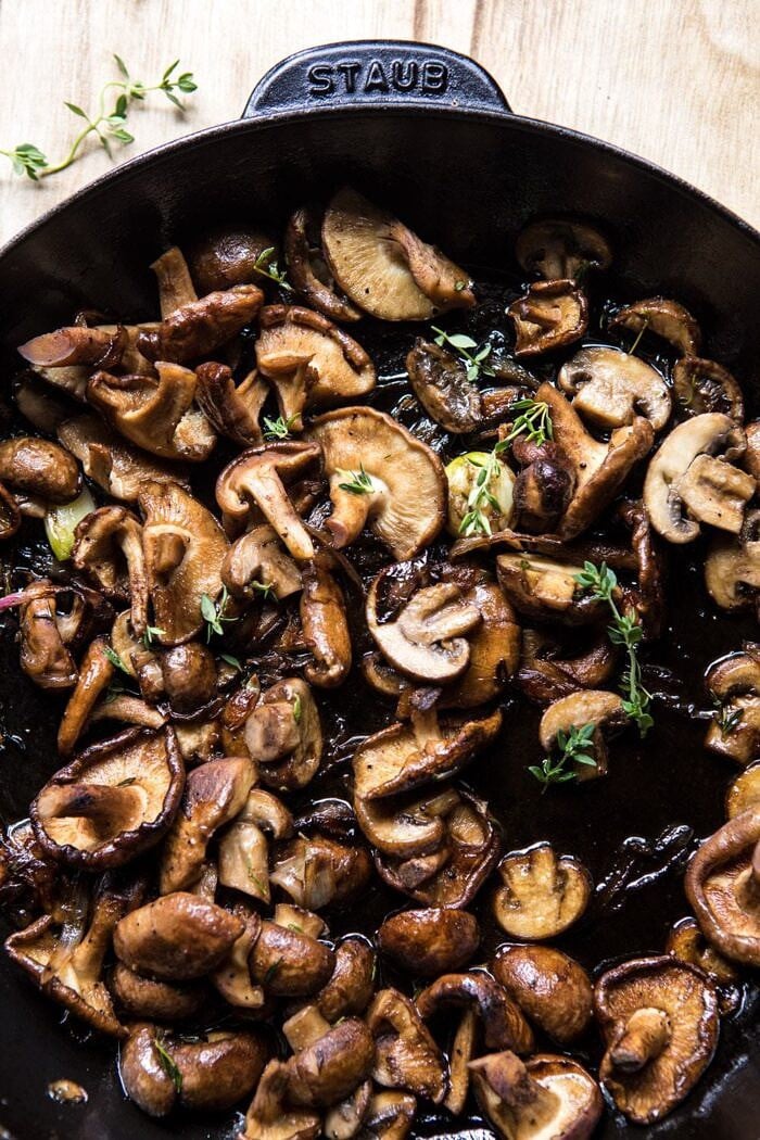 overhead photo of Herby Buttered Balsamic Mushrooms in skillet 