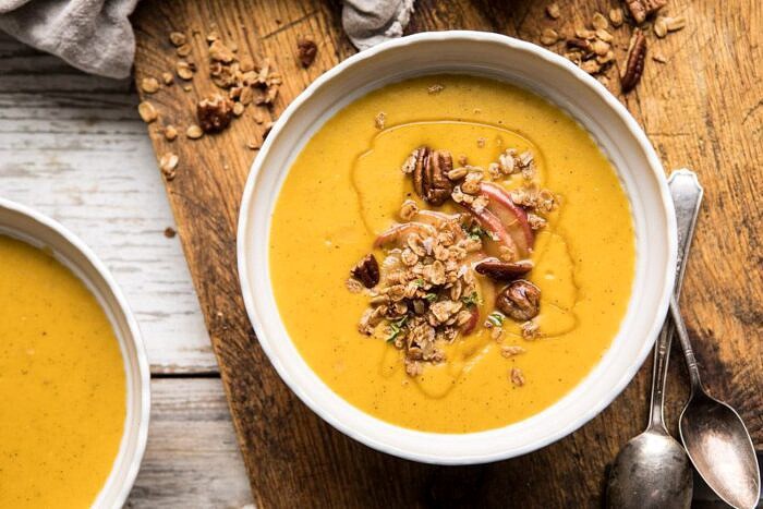 horizontal photo of Cheddar Apple Butternut Squash Soup with Cinnamon Pecan Crumble
