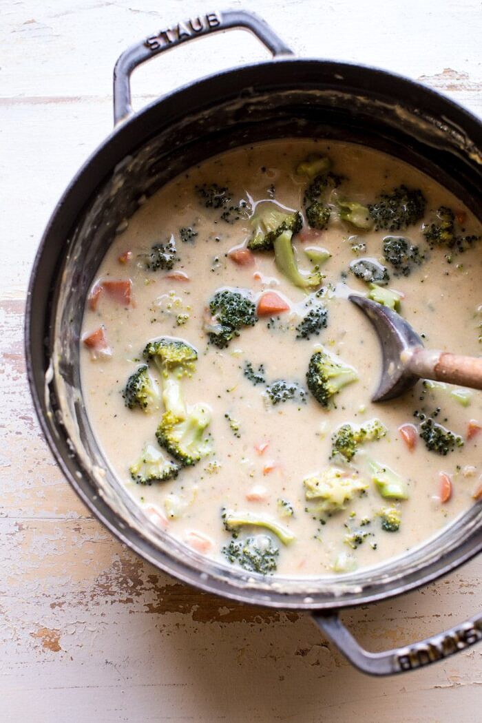 Homemade Broccoli Cheddar soup in pot before baking