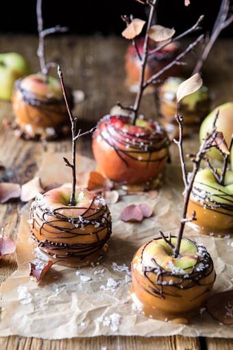 Sweet and Salty Chocolate Drizzled Cider Caramel Apples | halfbakedharvest.com #fallrecipes #apples #caramel #hallaween #thanksgiving