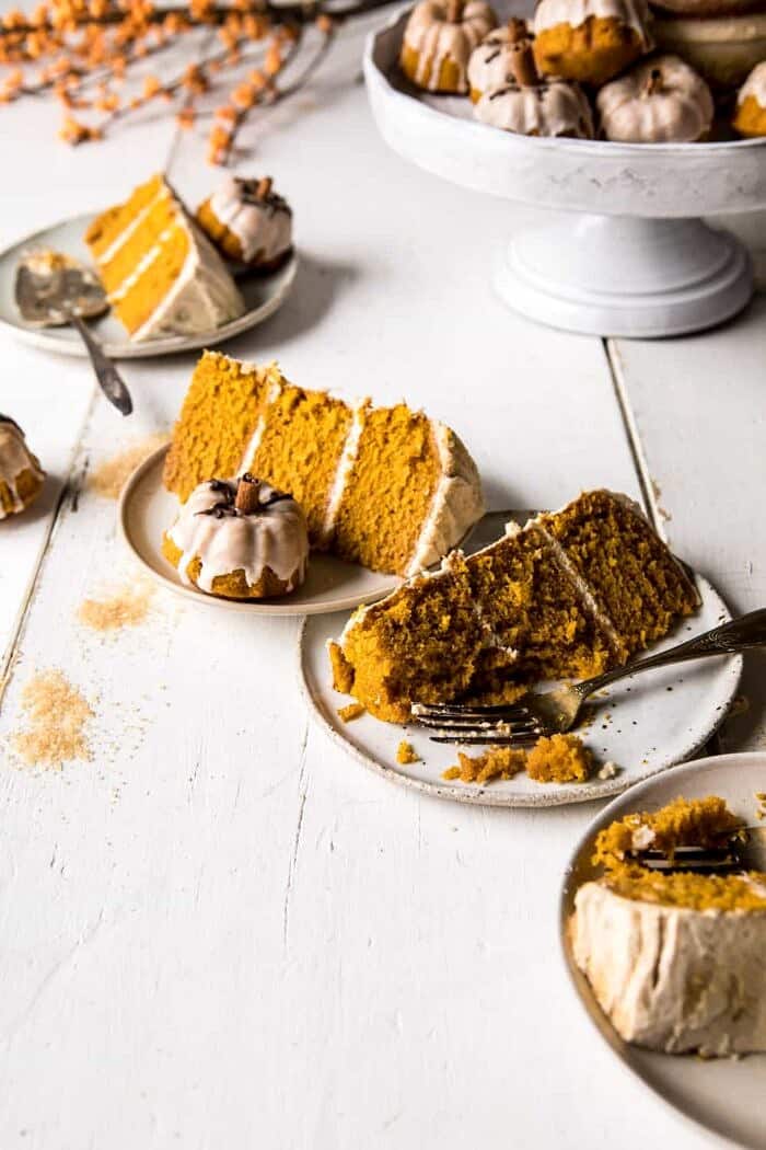 side angle photo of Chai Pumpkin Cake slices with cake stand in photo 