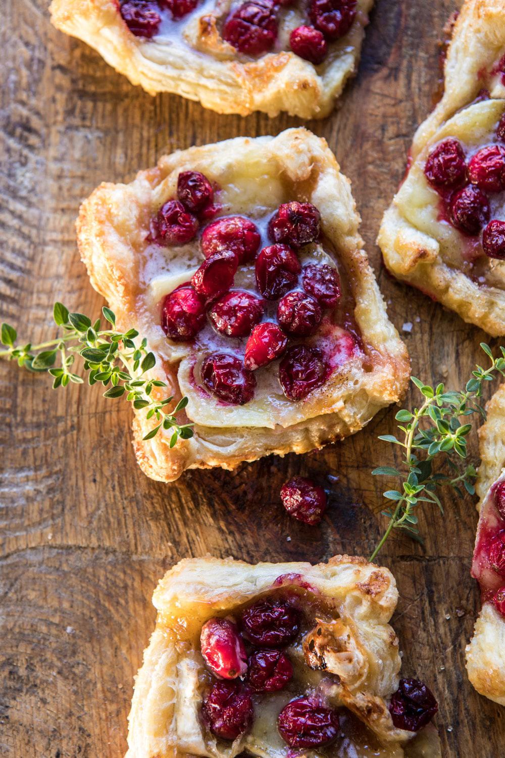 Cranberry Brie Pastry Tarts | halfbakedharvest.com #brie #cranberries #appetizers #thanksgiving #christmas