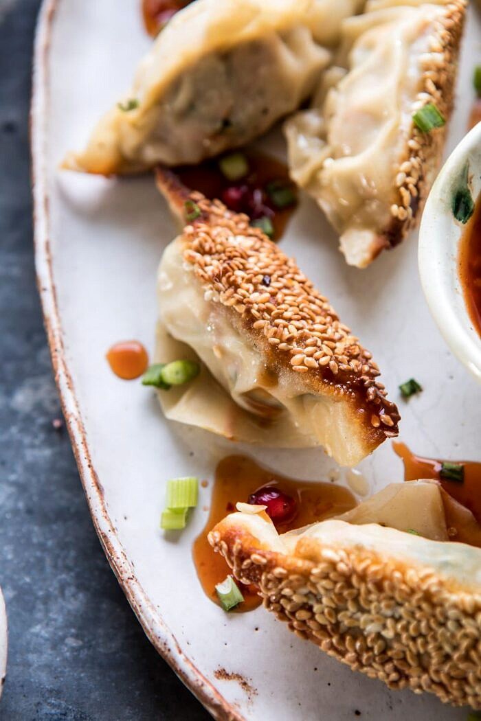 close up photo of Ginger Sesame Chicken Potstickers with Sweet Chili Pomegranate Sauce