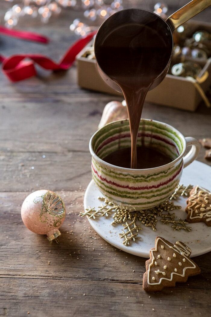 Vanilla Mocha Hot Cocoa being poured into cocoa mug