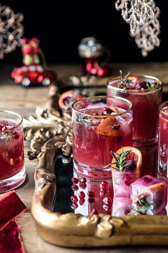 Holiday Cheermeister Bourbon Punch | halfbakedharvest.com #bourbon #holiday #christmas #cocktails #pomegranate