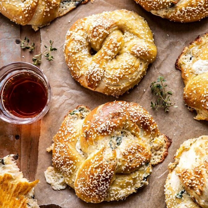 Spinach and Artichoke Stuffed Soft Pretzels | halfbakedharvest.com #softpretzels #appetizer #easyrecipes #pretzels #snacks