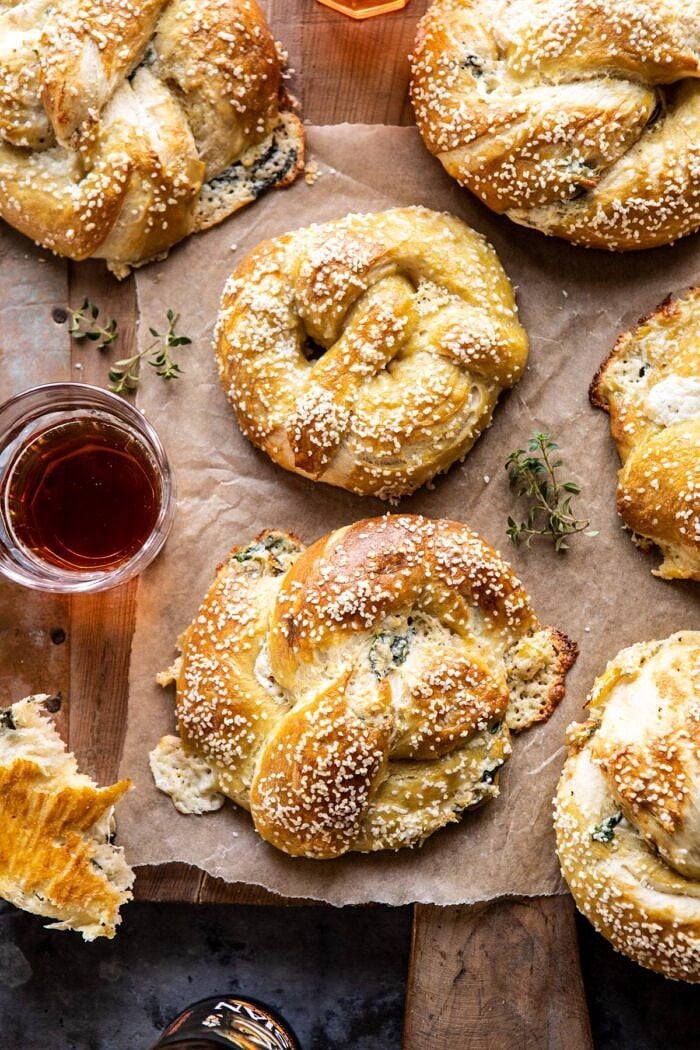 Spinach and Artichoke Stuffed Soft Pretzels | halfbakedharvest.com #softpretzels #appetizer #easyrecipes #pretzels #snacks
