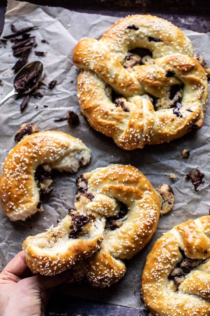 Chocolate Chip Cookie Stuffed Soft Pretzel torn apart and chocolate oozing out 
