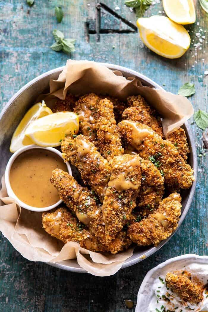 overhead close up photo of Baked Black Pepper Ranch Chicken Fingers with Honey Mustard