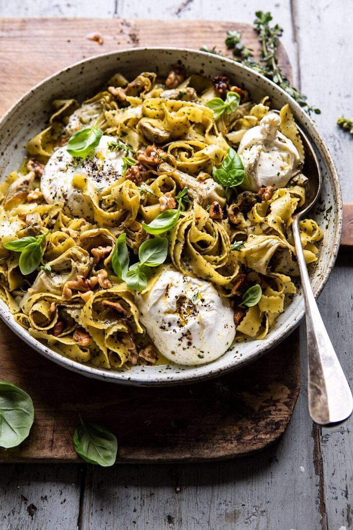 side angled photo of Roasted Lemon Artichoke and Browned Butter Pasta with spoon in bowl