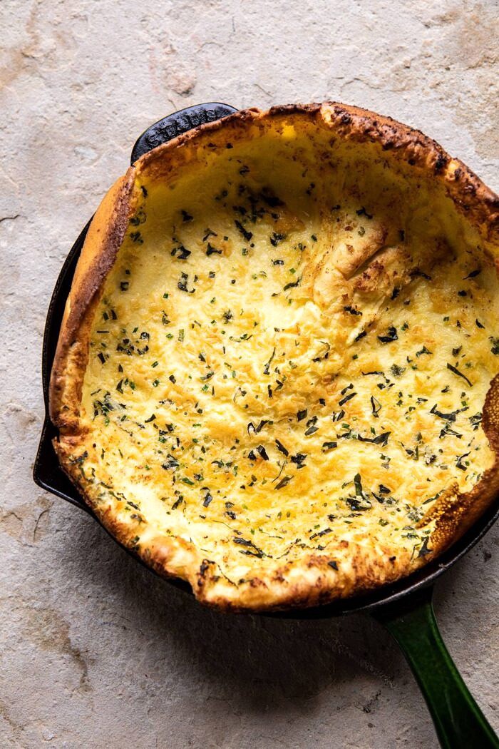 Savory Herb Butter Dutch Baby in skillet before adding toppings
