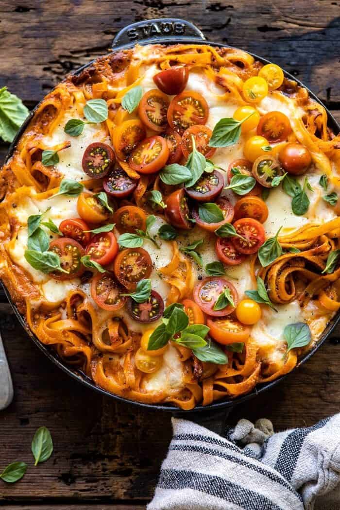 overhead close up photo of One Pot 30 Minute Creamy Tomato Basil Pasta Bake in skillet 