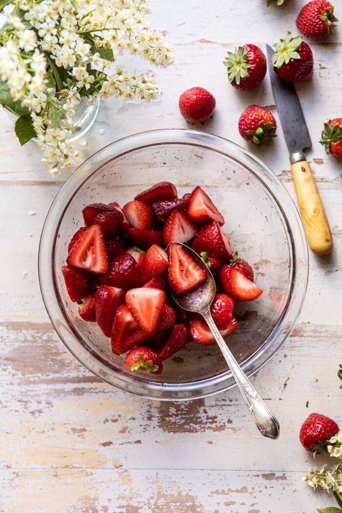 overhead photo of macerated strawberries in bowl