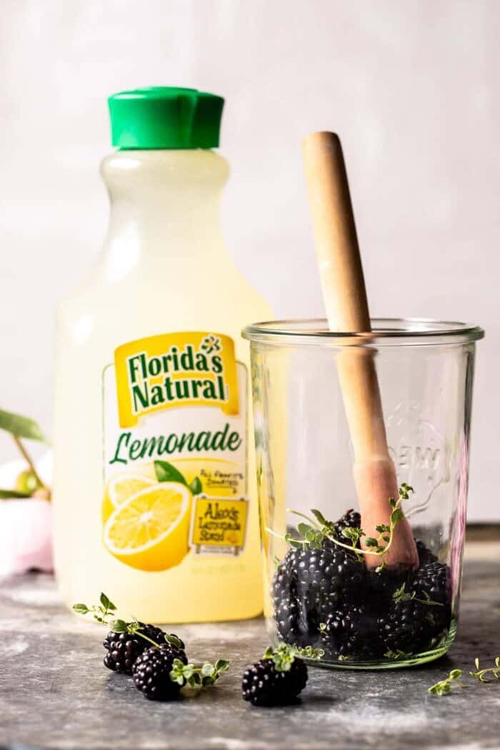 Blackberry Tequila Lemon Cooler being mixed in glass jar