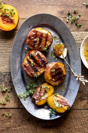 Prosciutto Goat Cheese Stuffed Peaches with Thyme Honey | halfbakedharvest.com #peaches #appetizer #goatcheese