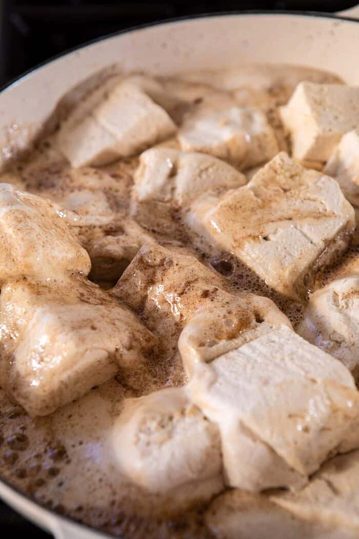 photo of marshmallows melting into browned butter on stove-top